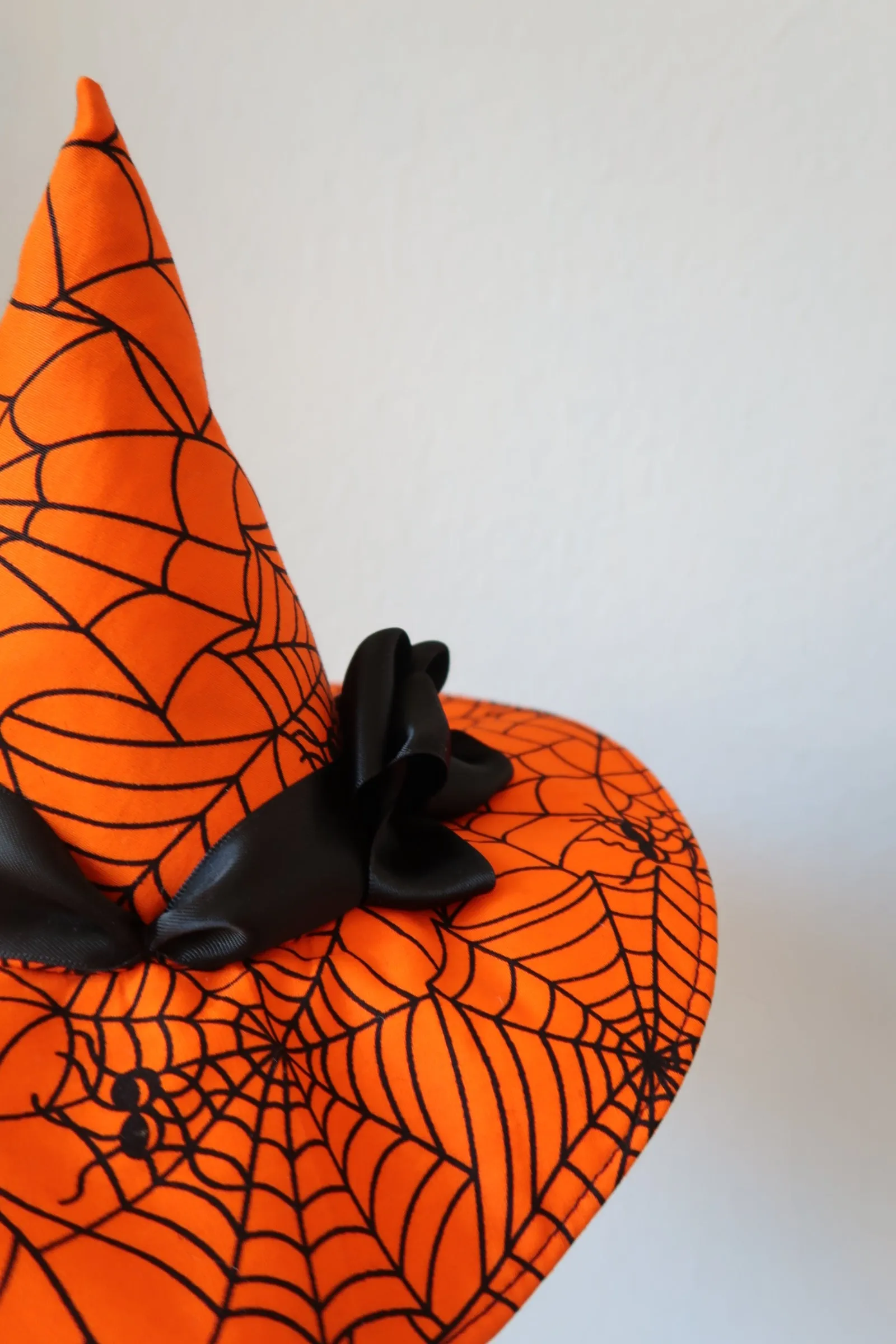 Mini Witch Hat Fascinator (bright orange spiderweb)